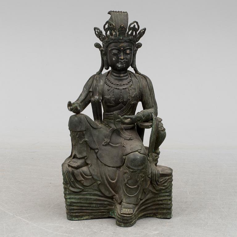 A mid 20th century metal Guan Yin figurine, China.