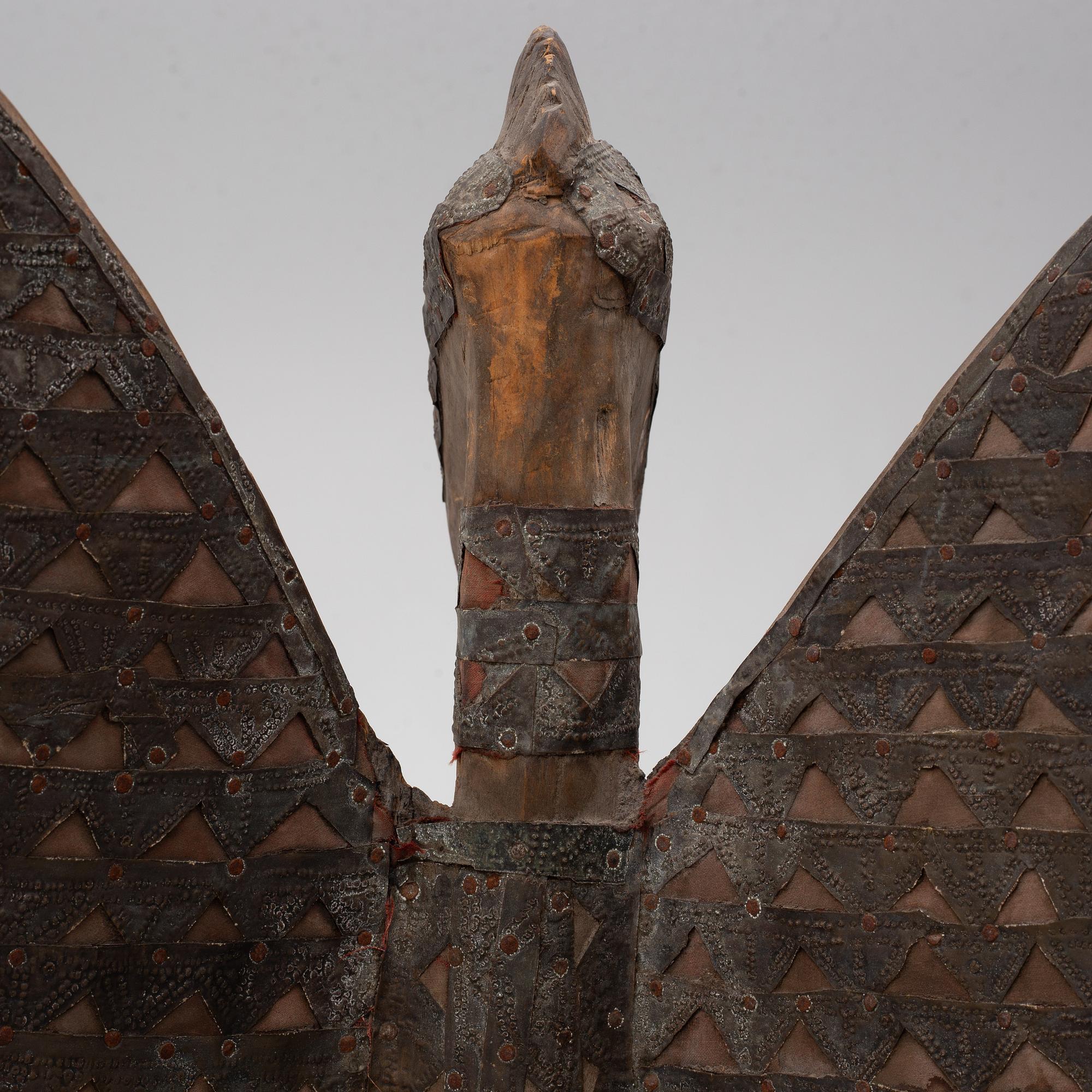 A sculpture, likely Ivory Coast, 20th century.