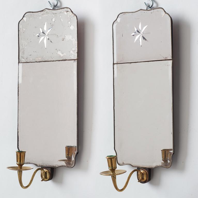 A pair of Rococo one-light girandole mirrors by Nils Meunier 1771.