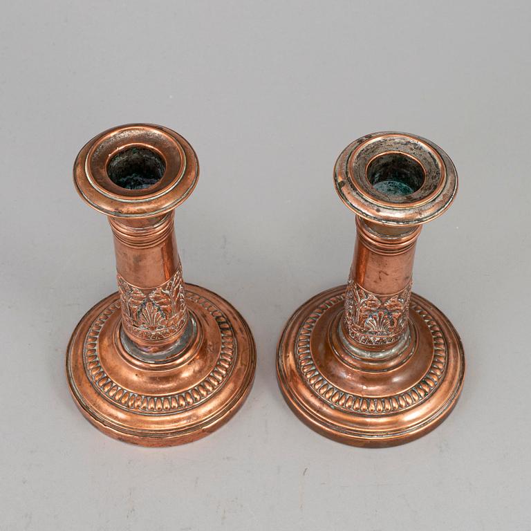 A pair of English early 19th century candlesticks.