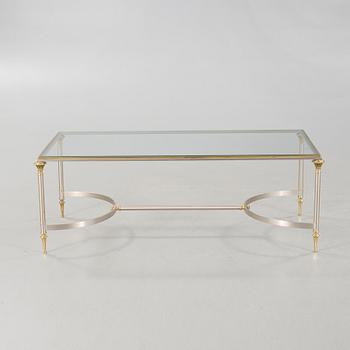 A glass and metal table, possibly Nordiska Kompaniet. 20th century.