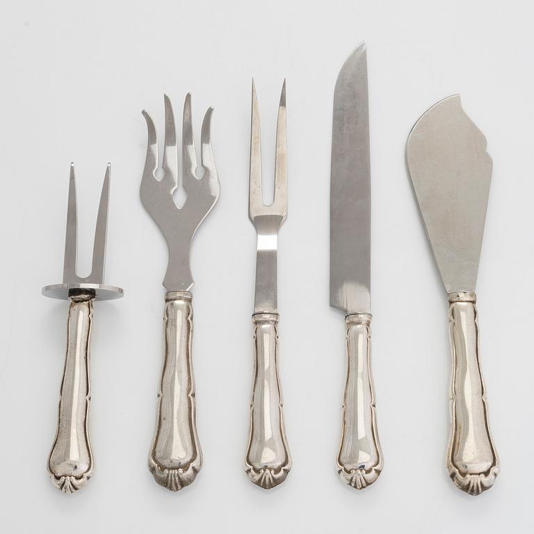 A 47-piece set of 'Chippendale' silver cutlery and a pair of silver candlesticks, Finnish marks 1983-2003 and 1976.