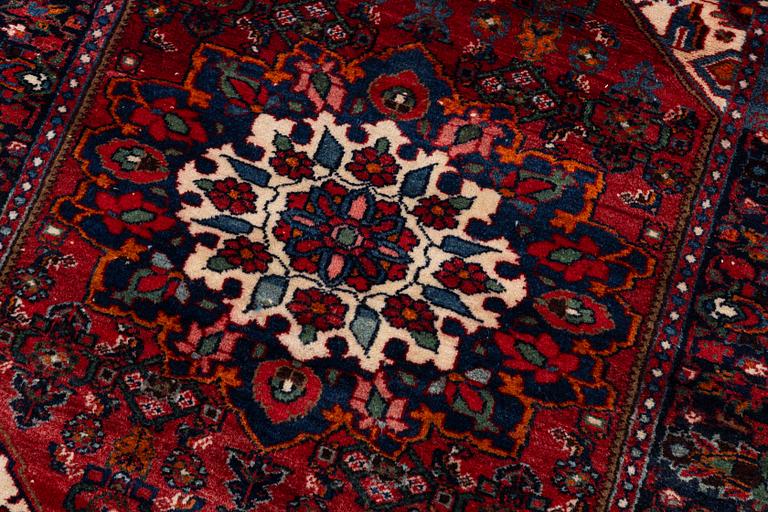 An Old Northwest Persian rug, c. 127 x 125 cm.