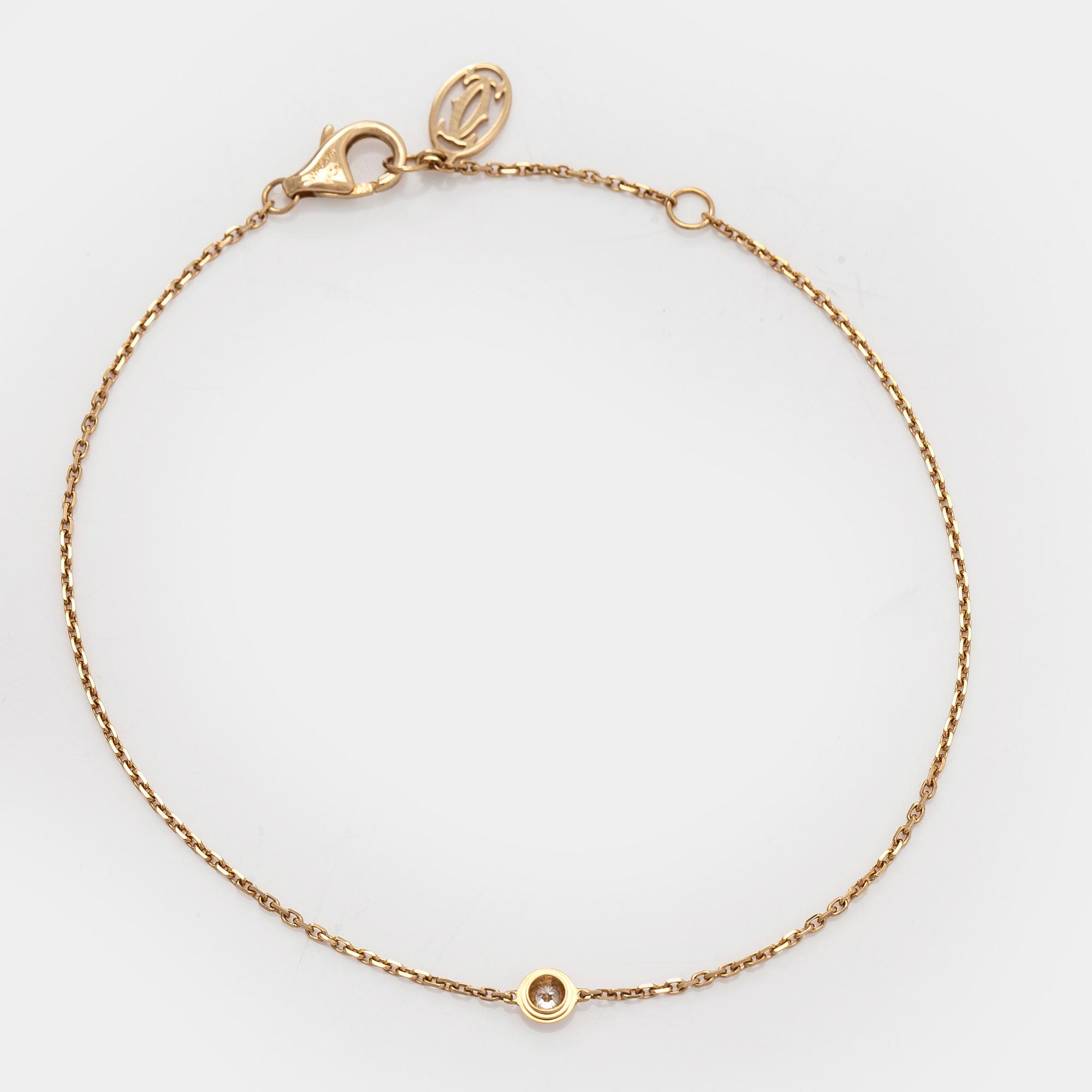 Cartier, armband, "d'Amour", 18K guld med en briljantslipad diamant.