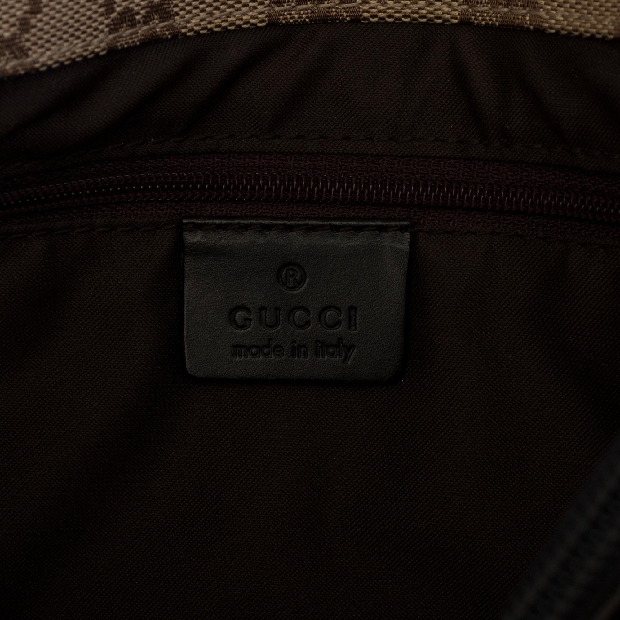 GUCCI, a monogram fabric hand bag and beauty bag.