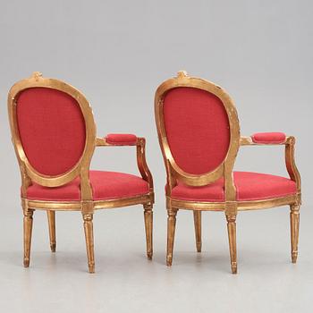 A pair of Gustavian late 18th century armchairs.