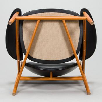 Finn Juhl, a 'Chieftain Chair' / model 'FJ49' armchair for OneCollection House of Finn Juhl, Denmark 2000s.