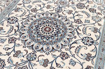 A carpet, Nain, ca. 300 x 193 cm.