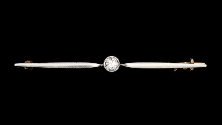 BROSCH, 14 K vit- och rödguld, med gammalslipad diamant ca 0,30 ct. Vikt 4,1 g.