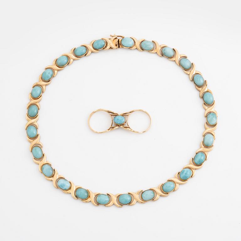 14K gold necklace and ring, with cabochon cut blue stones.