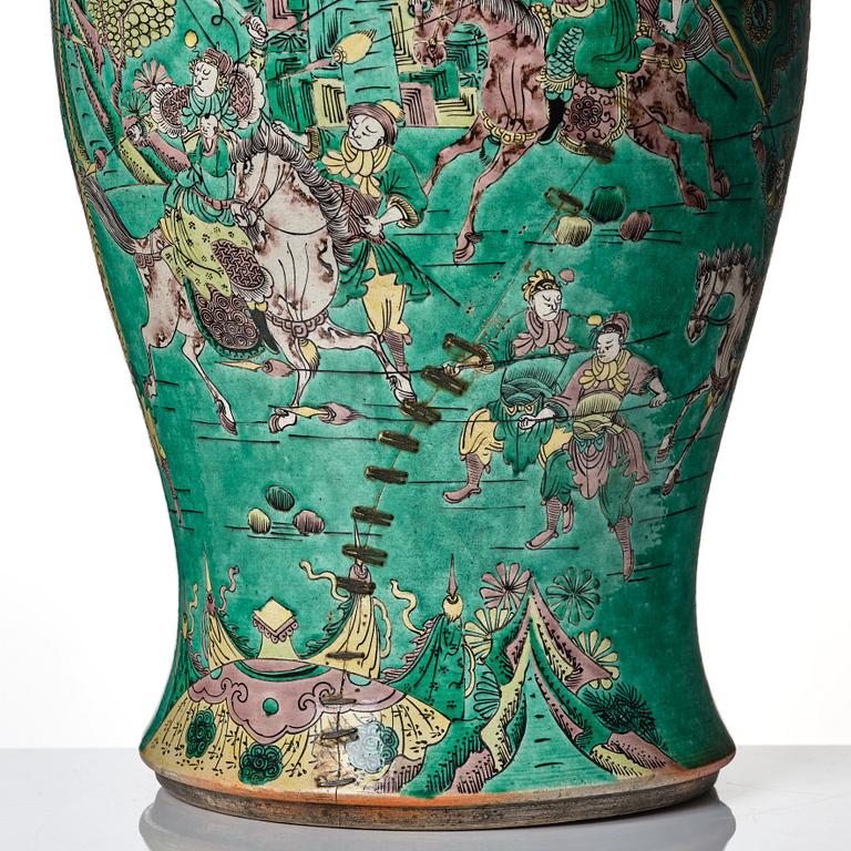 A massive famille verte bisquit vase, Qing dynasty with Kangxi mark to base.