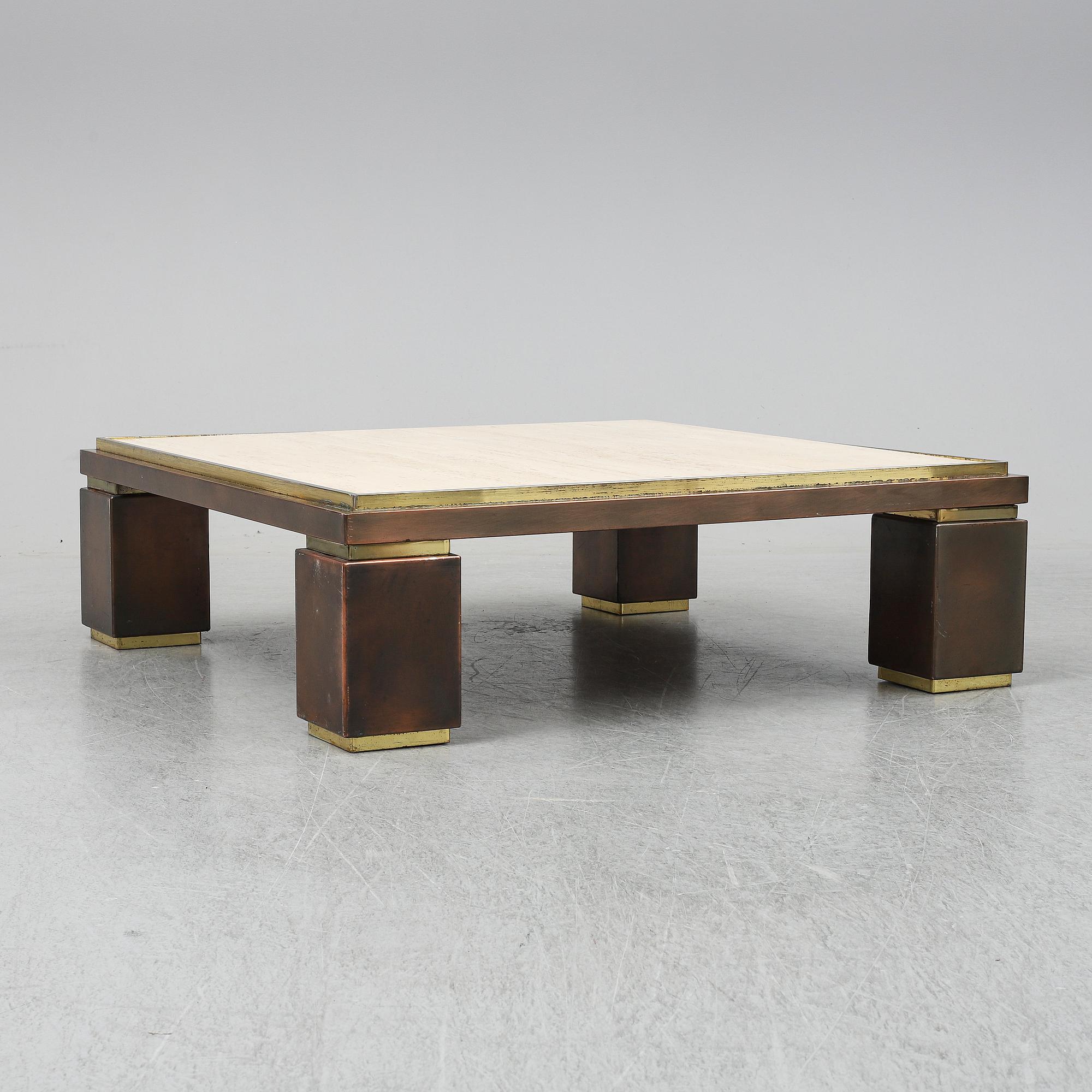 A travetine and brass sofa table, 1970s, probably Belgo Chrome.