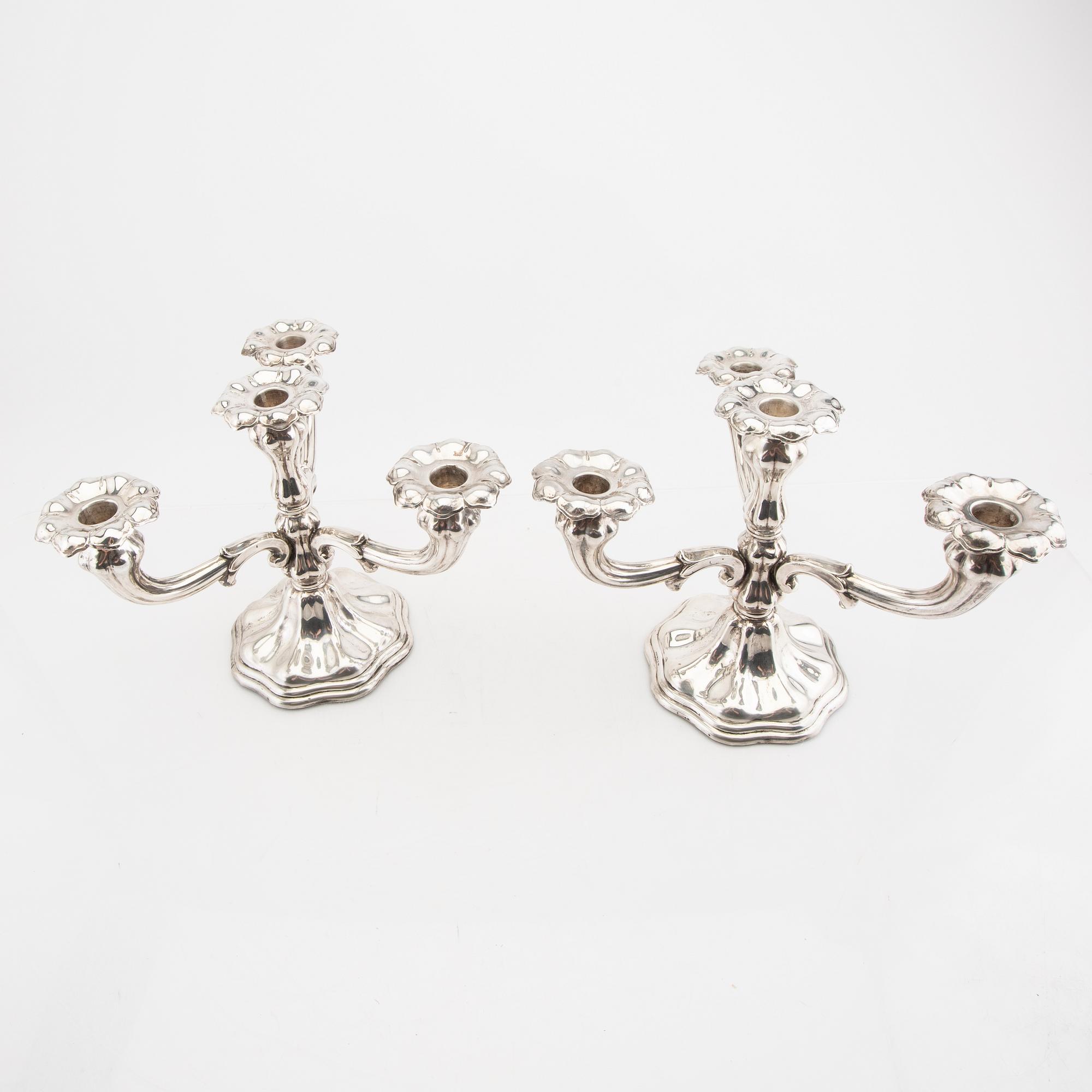 A Swdish 20th century pair of silver candelabra maark of CG Hallberg Stocholm 1946.