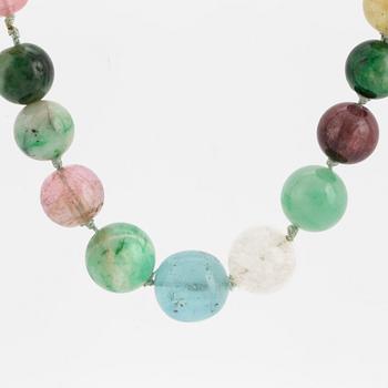 A necklace of multi-coloured stone beads with an 14K gold clasp.