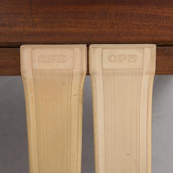 a 1960s teak "Kandidaten" armchair designed by IB Kofod Larsen for OPE Möbler, Jönköping.