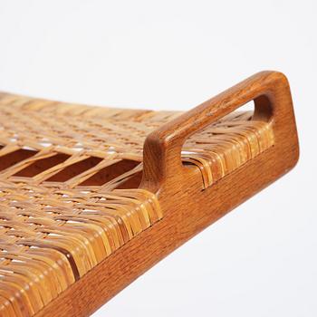 Hans J. Wegner, a foldable easy chair model 512, Johannes Hansen, Copenhagen, 1950s-60s.