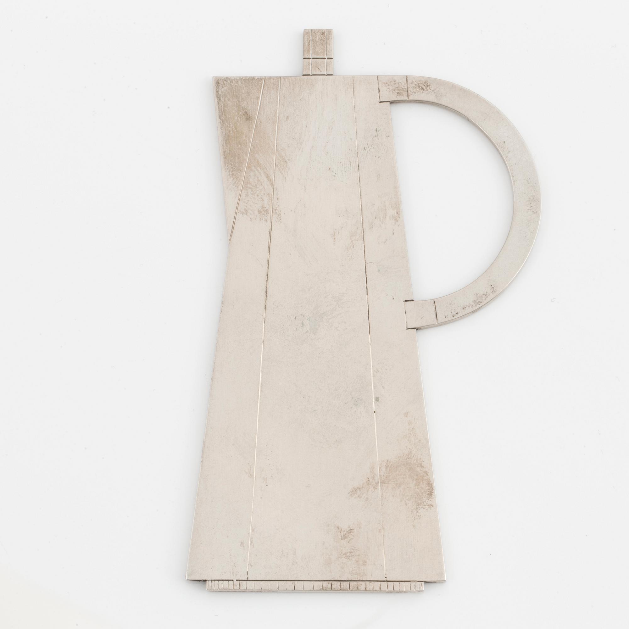 WIWEN NILSSON, underlägg i form av kaffekanna, silver.