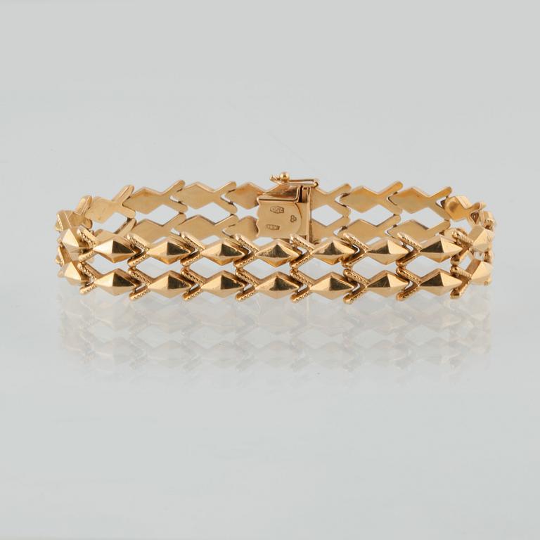 ARMBAND, 18K guld, kattfotstämplat. Vikt 20,7 gram.