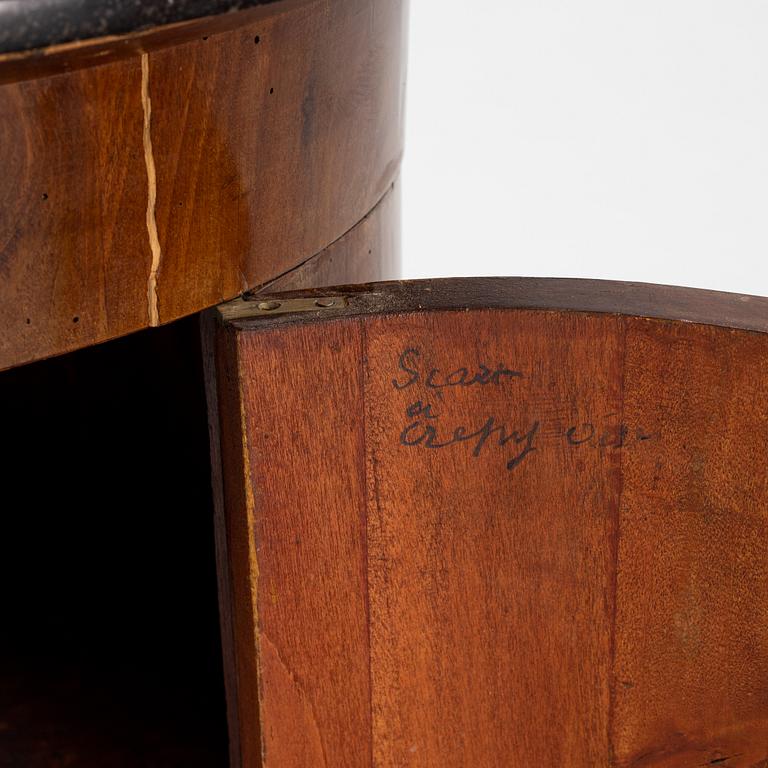 A mahogany veneered cabinet/bedside table with stone top, 19th Century.