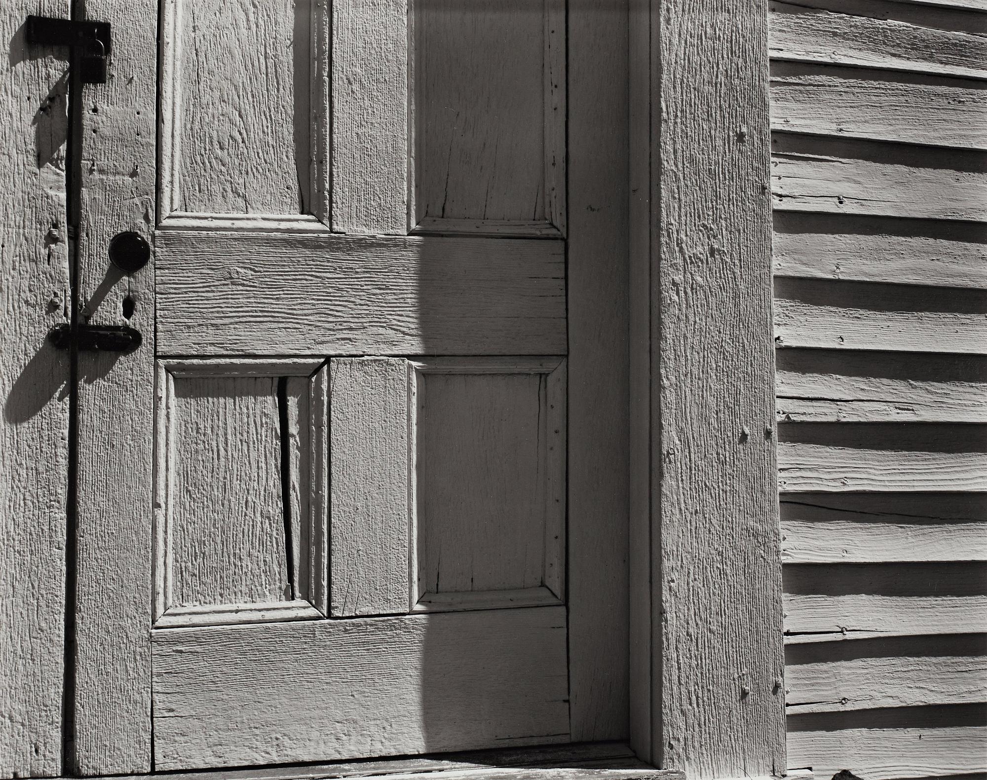 Edward Weston, "Church Door, Hornitus, California, 1940".
