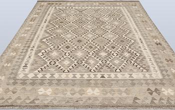 A Kilim rug, approx. 297 x 201 cm.