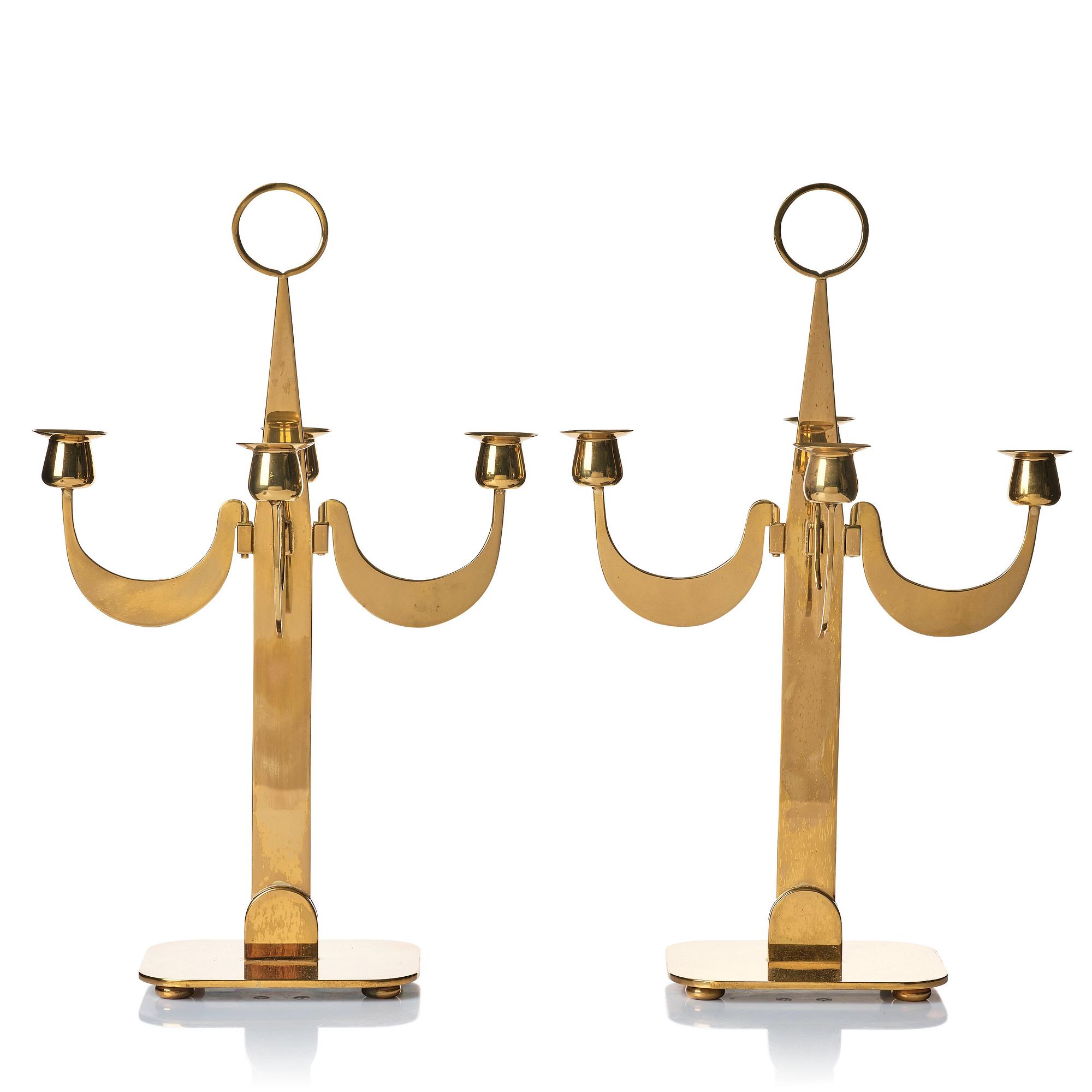 Josef Frank, a pair of brass candelabra by Svenskt Tenn, Sweden 1950's, model nr 2663.