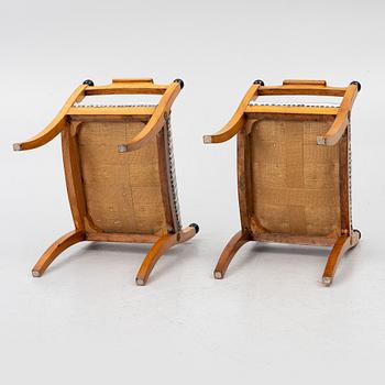 A pair of late Empire stools, mid-19th century.