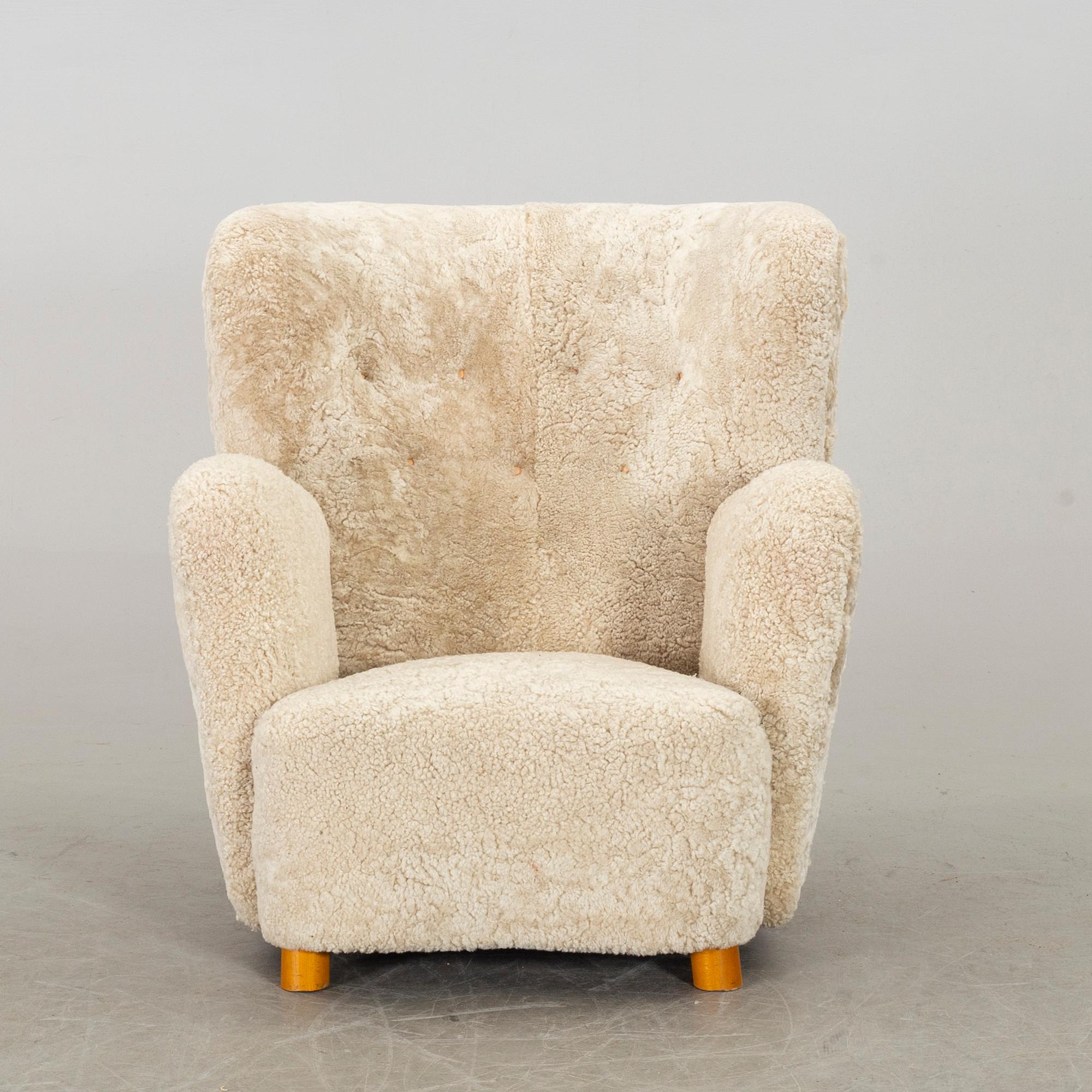 A DANISH SHEEPSKIN ARMCHAIR, 1940-50's.
