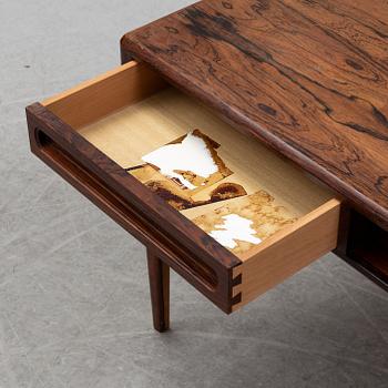 A 1960's rosewood coffee table.