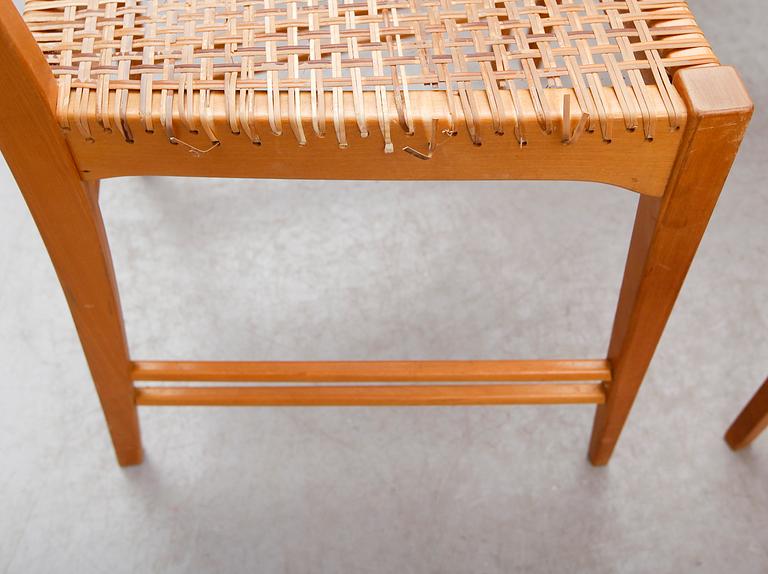 A set of six Erik Chambert 'Poem' birch and rattan dining chairs, Chambert's, Norrköping, Sweden, probably 1950's.