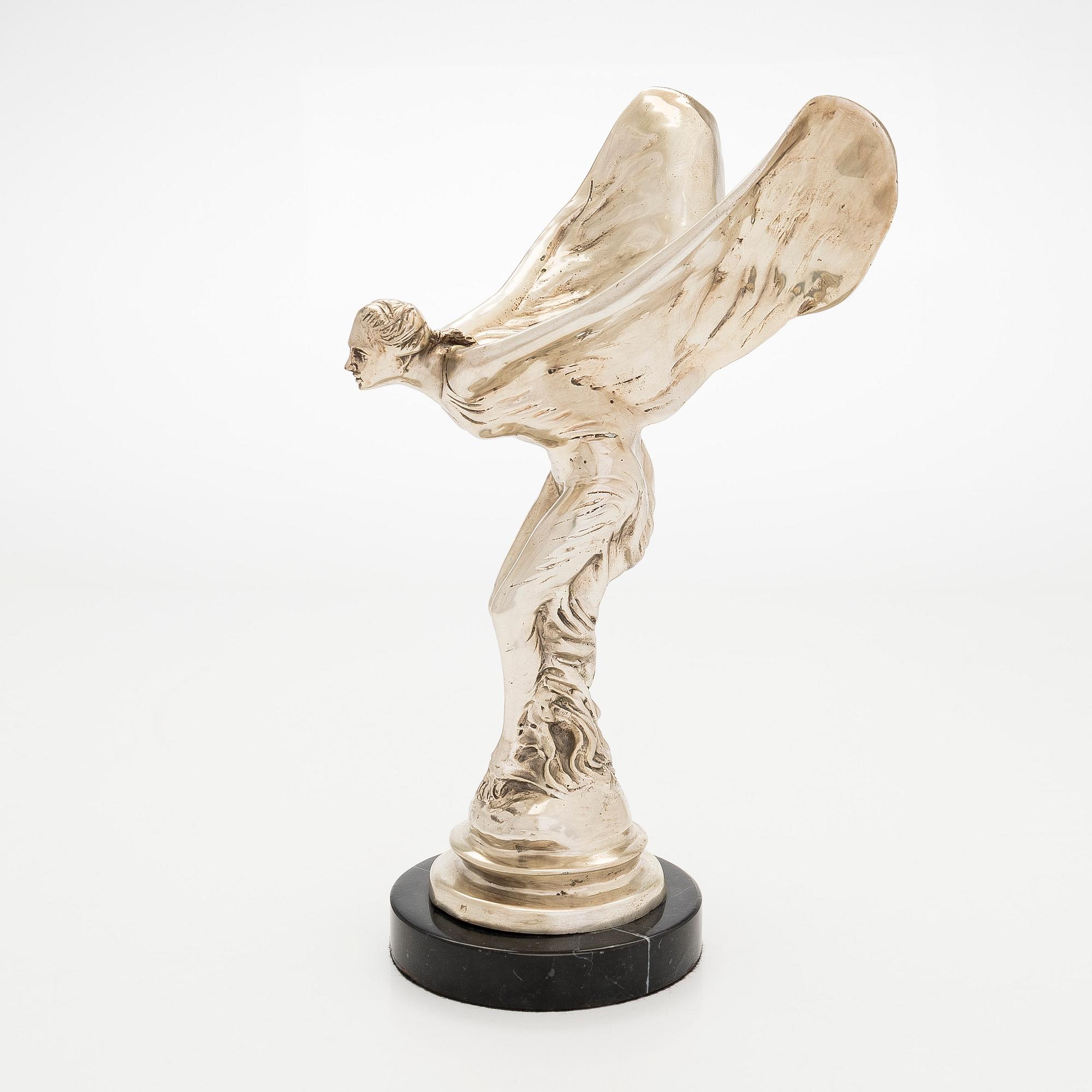 Skulptur, "Spirit of Ecstacy", symbol för Rolls-Royce, 1900-tal.