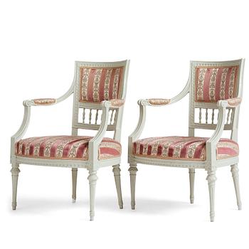 A pair of Gustavian armschairs bu J E Höglander.