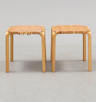 A pair of 1950s / 60s Alvar Aalto Y 61 stools.