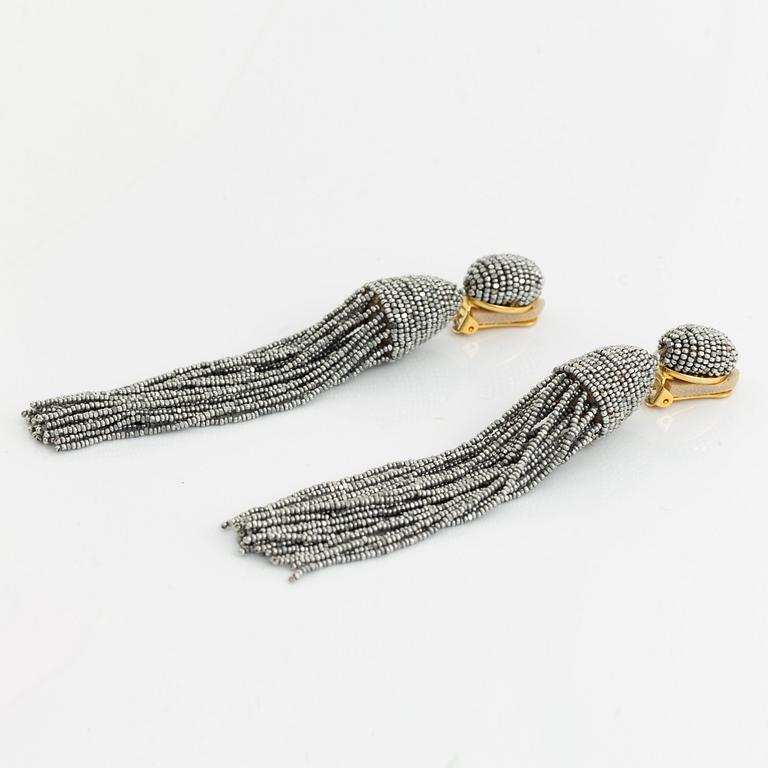 Oscar De La Renta, tassel earrings.