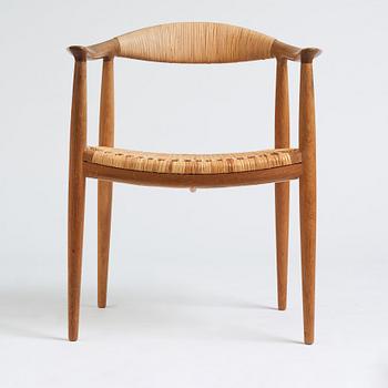 Hans J. Wegner, an oak and rattan 'The Chair', JH501, Johannes Hansen, Denmark.