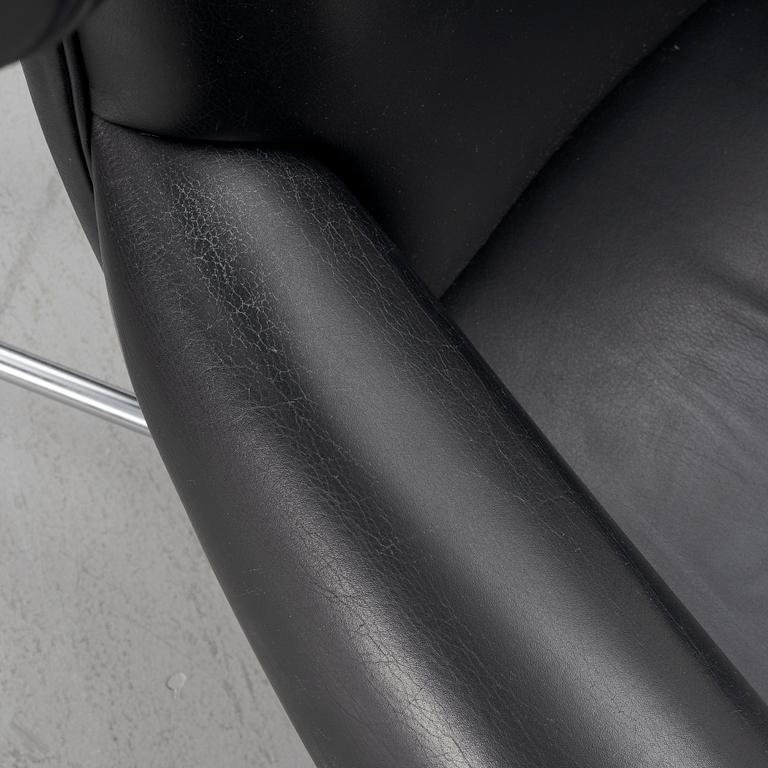 Hans J. Wegner, fåtölj med fotpall, "Ox Chair", EJ-100, Erik Jørgensen Møbelfabrik A/S, Svendborg, Danmark.