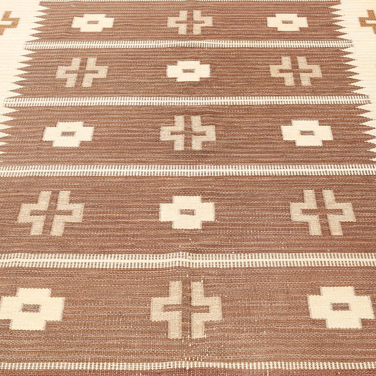 A carpet, flat weave, ca 291 x 202 cm, signed SH.