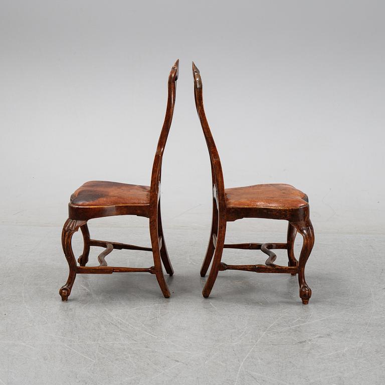 A set of nine English stained beech wood chairs, first half of the 18th Century.