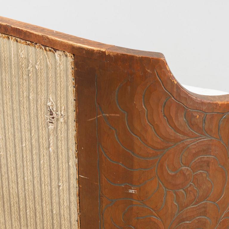 Otto Wretling, attributed to, an Art Nouveau pine sofa, Sweden early 20thC.