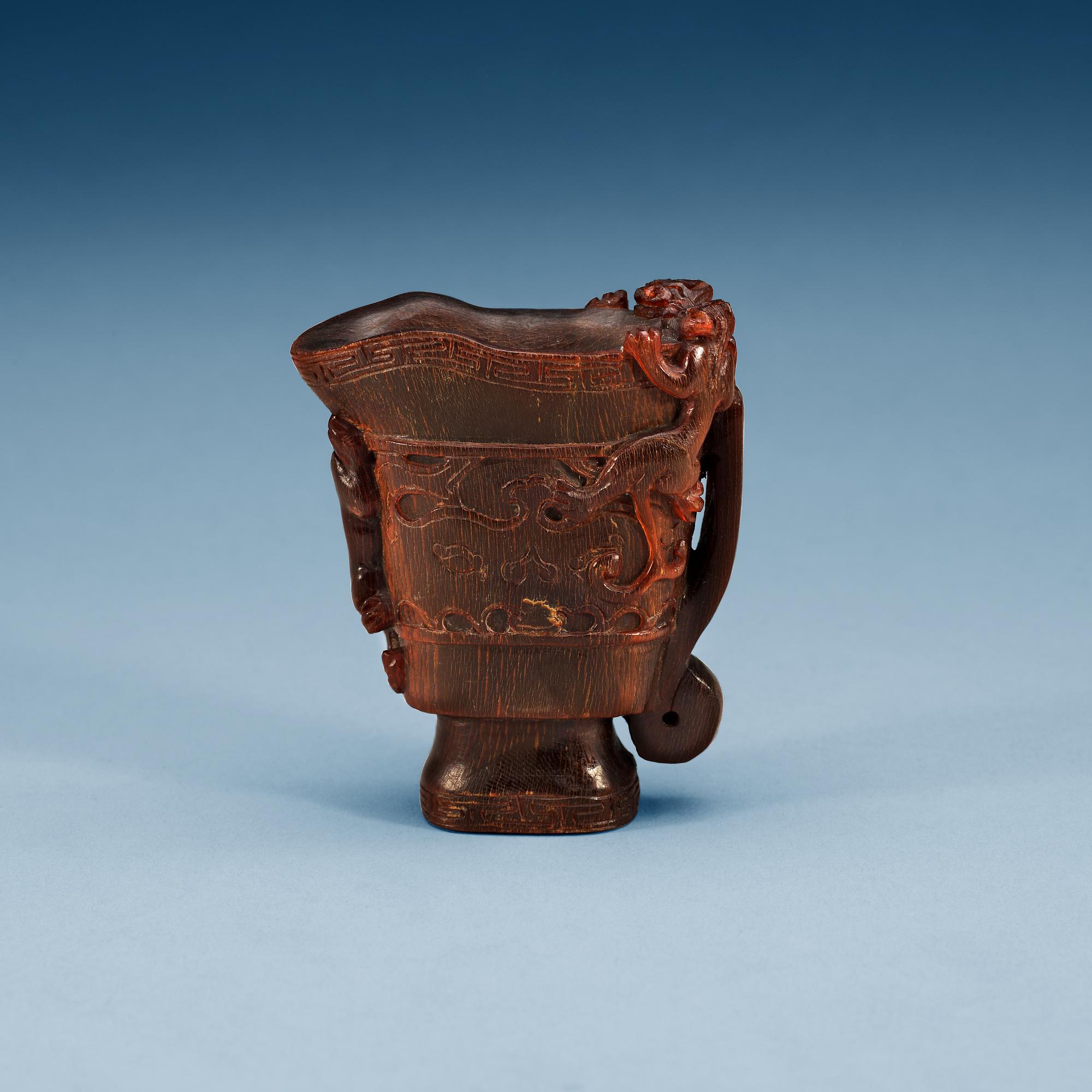 A rhinoserous libation cup, late Qing dynasty.