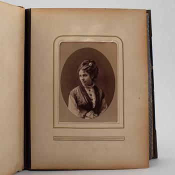 A PHOTO ALBUM, ca 150 photos, secod half of the 19th century.