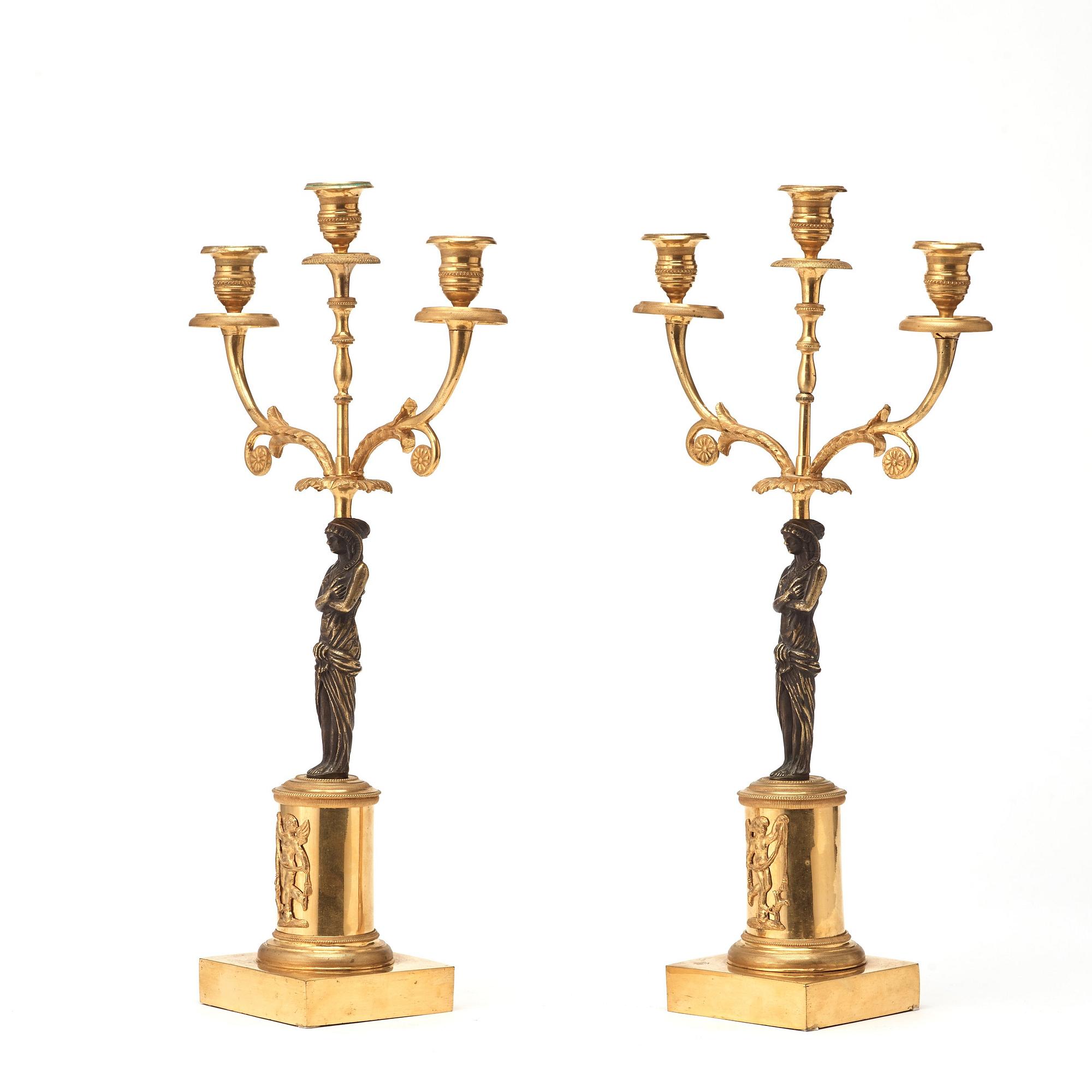 A pair of late Gustavian circa 1800 three-light candelabra.