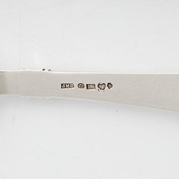 Five silver servers, three with mark of Eric Löfman, MGAB, Lidköping. Two with mark JMJ and Swedish import.