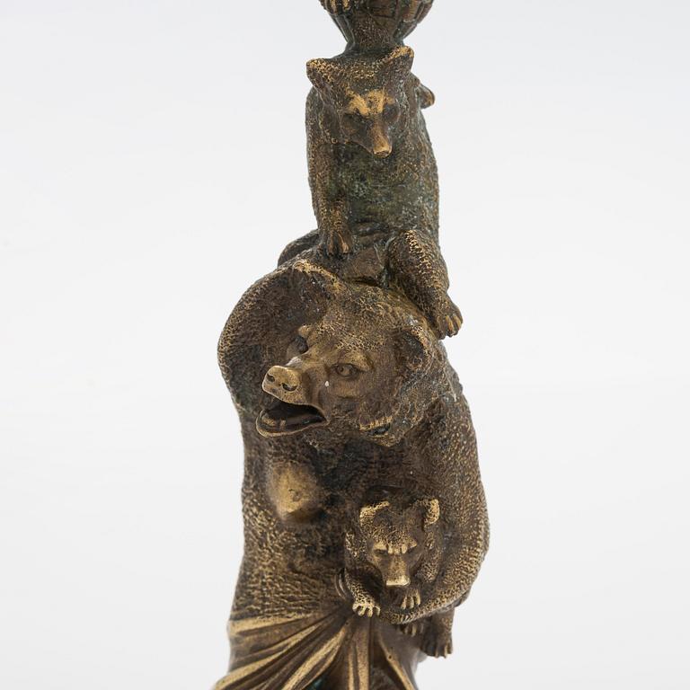 A Russian bronze candle holder, circa 1900.