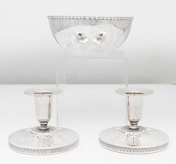 A pair of Swedish silver candlesticks, and a bowl, 1930s–60s.