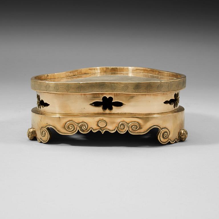 A polished copper alloy stand, Qing dynasty, 18/19th Century.