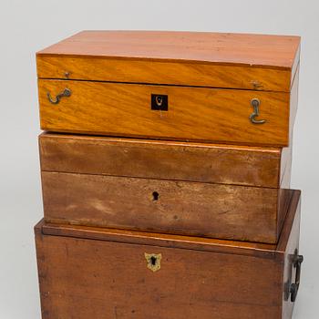 A set of three wodden boxes for microscopes, around 1900.