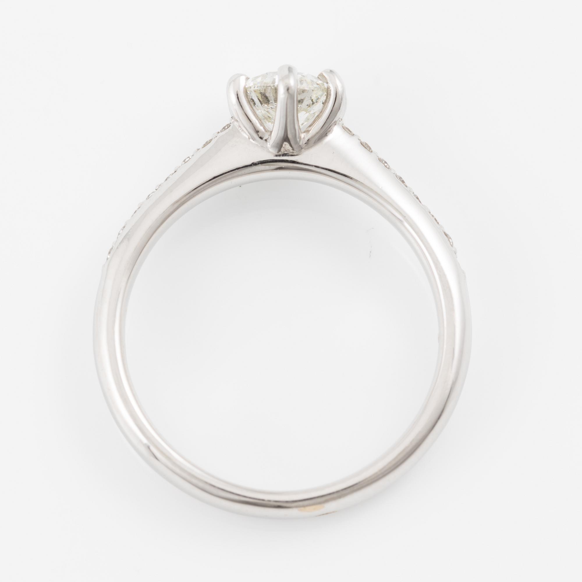 Ring, 18K white gold with brilliant-cut diamond.