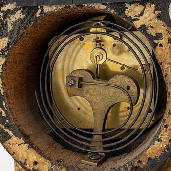 An Empire mantle clock, 19th Century.