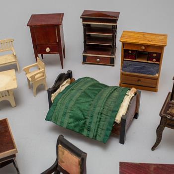 Circa 66 pieces of doll furniture with various accessories, ca 1900 and early 20th century.